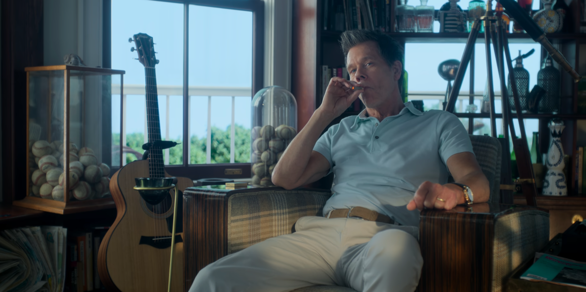 Kevin Bacon smoking a joint in Sirens